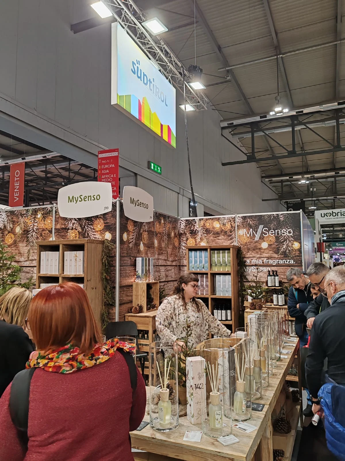 A trade fair booth under the brand Südtirol with visitors