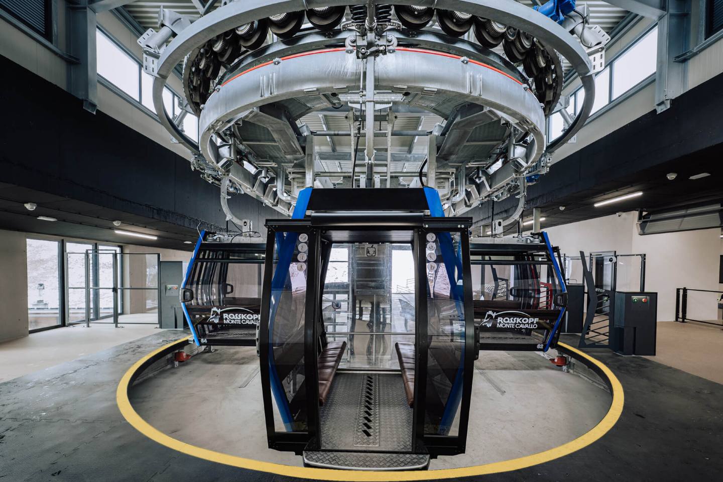 Open gondola in circulation area of cable car station