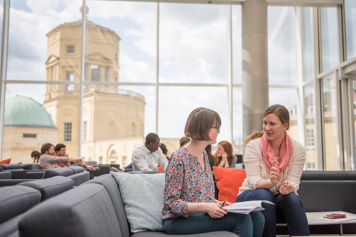 Students studying with the Radcliffe Observatory in the background