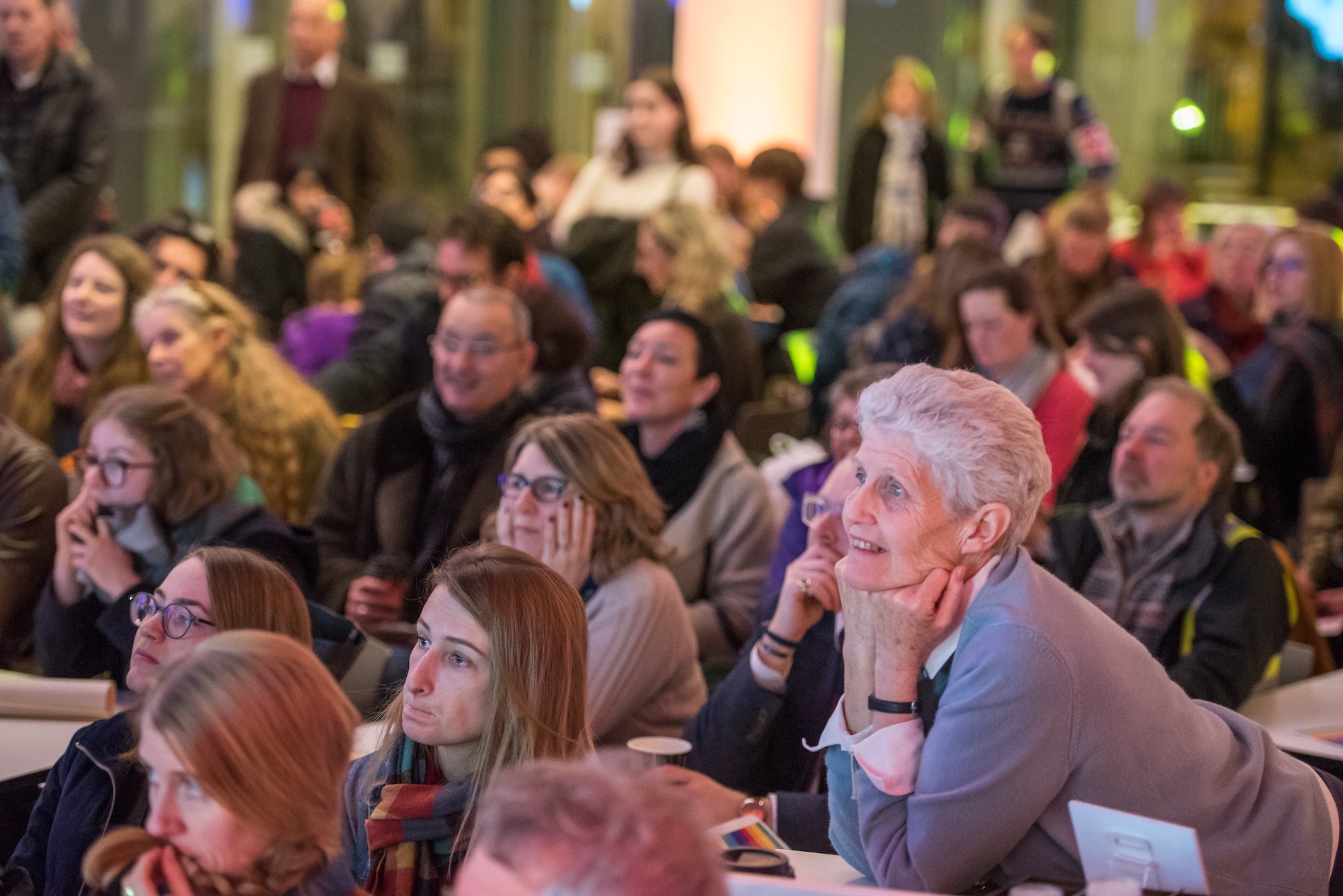 Audience members enjoying a lecture