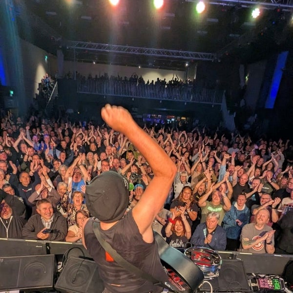 Middle aged white man at a Rock concert Middle aged white man at a Rock concert