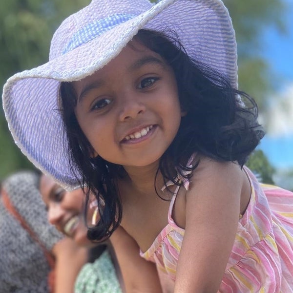 Esha in a sun hat Esha in a sun hat