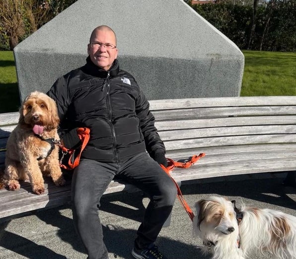 Image of Mart and his two dogs