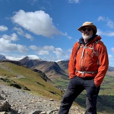 Elderly white man on a hike Elderly white man on a hike