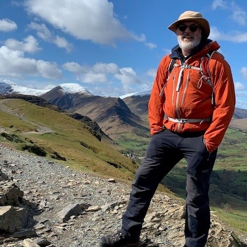 Elderly white man on a hike Elderly white man on a hike