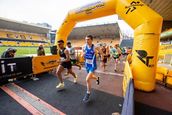 Runners cross the finish line at Wolverhampton 10K