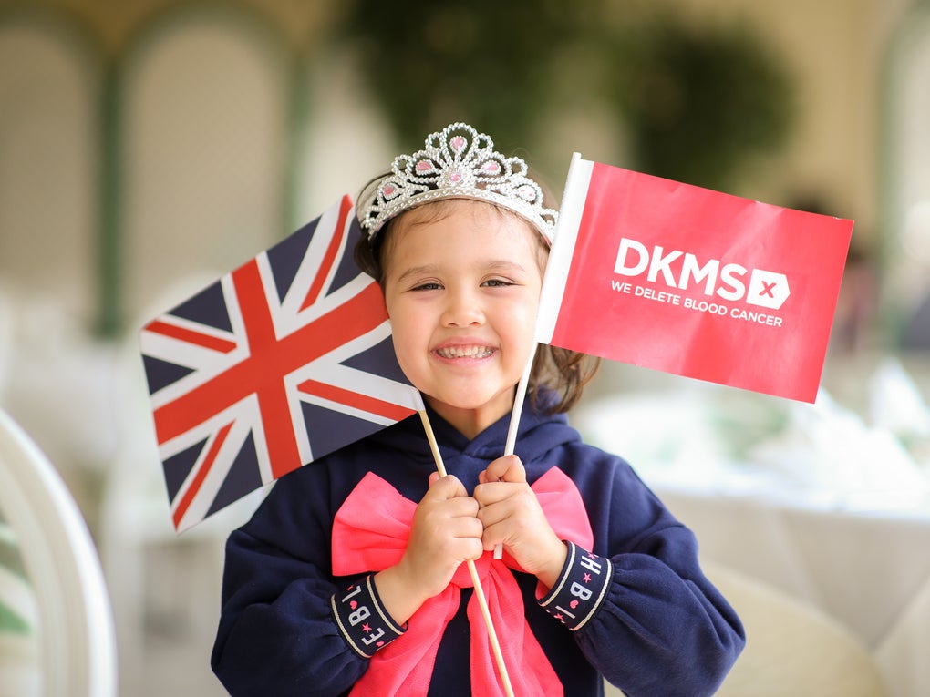 Image of Livia with a tiara, smiling at the camera Image of Livia with a tiara, smiling at the camera
