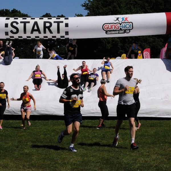 Runners at an inflatable obstacle course Runners at an inflatable obstacle course