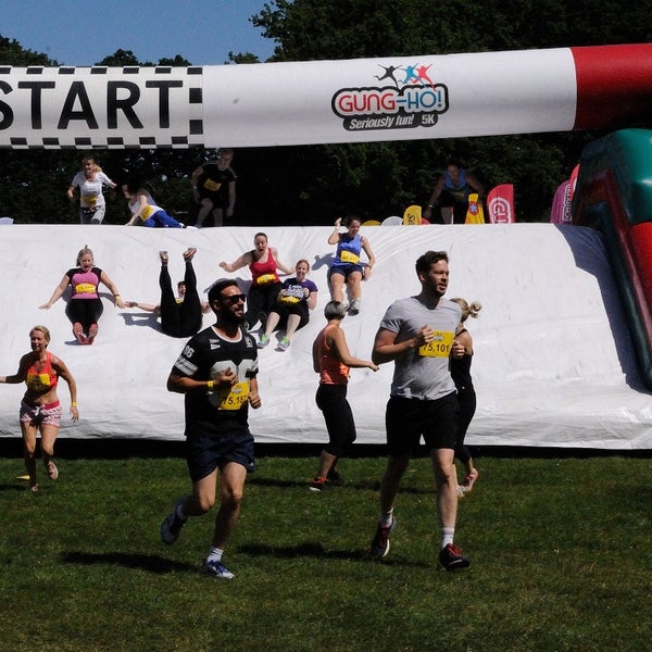 Runners at an inflatable obstacle course Runners at an inflatable obstacle course