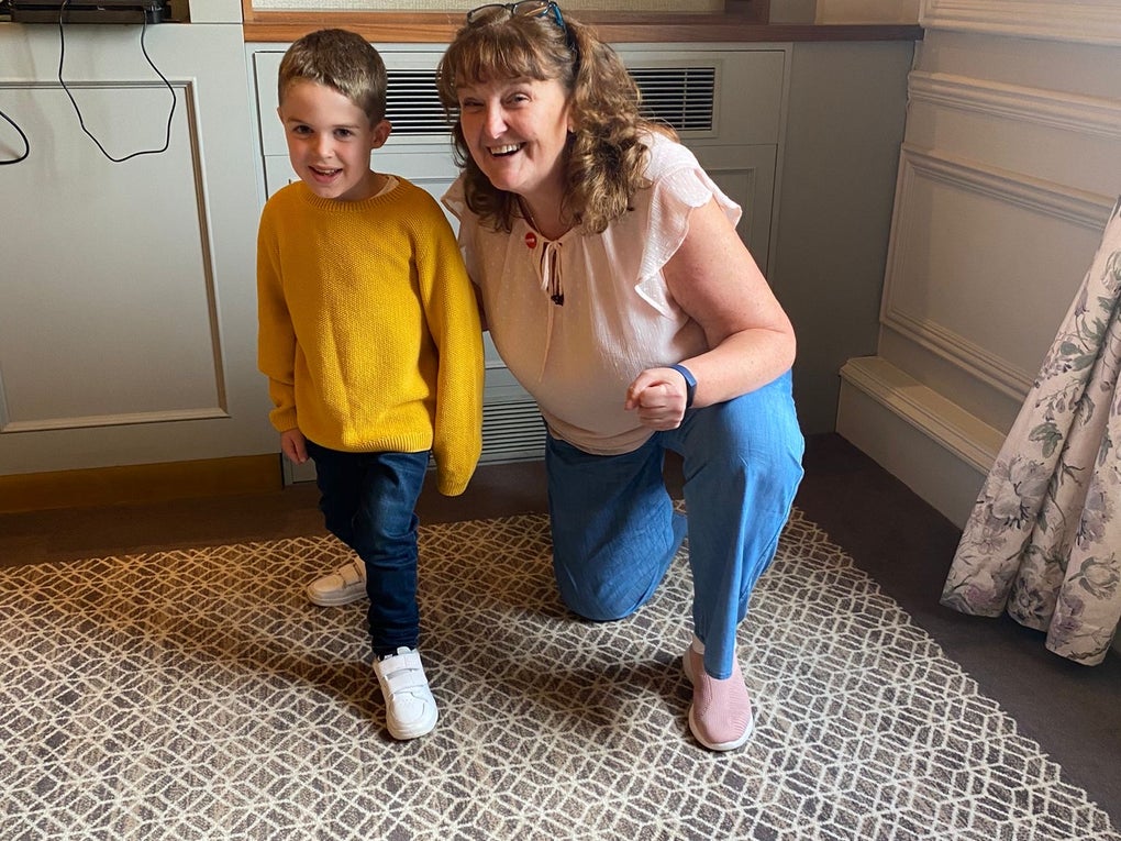 Middle aged woman and young boy Middle aged woman and young boy