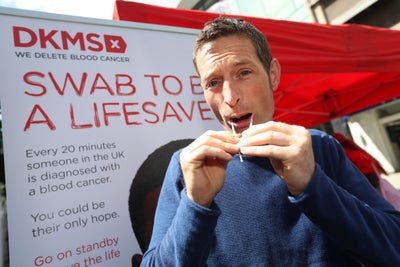 Man swabbing at DKMS event