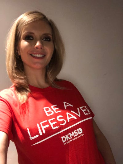 Rachel Riley in a red DKMS branded t-shirt