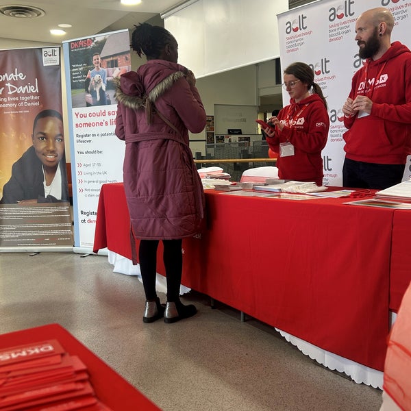 A person swabbing A person swabbing