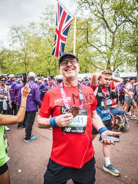 Mike with his medal at the 2024 London Marathon