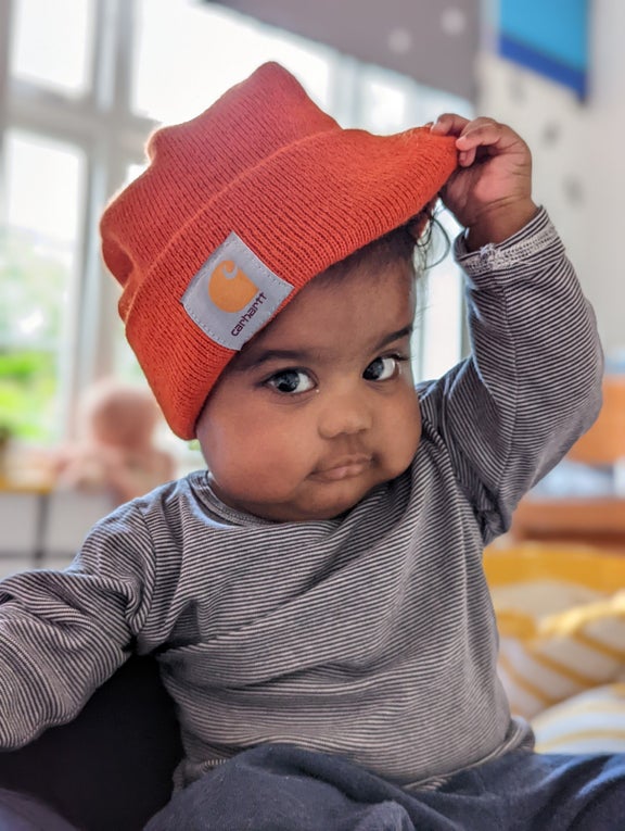 Image of Evie wearing a hat  Image of Evie wearing a hat