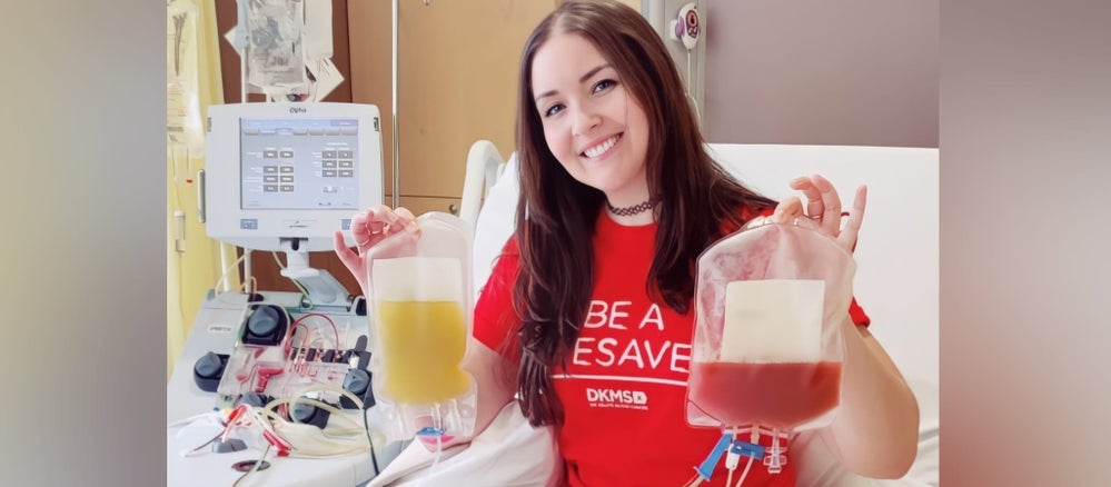 Rbecca with her donation Rbecca with her donation