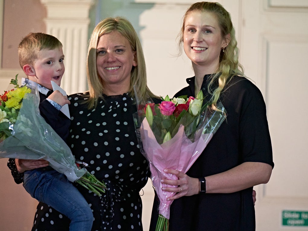Alfie with his Mum and Christin holding flowers when they met for the first time Alfie with his Mum and Christin holding flowers when they met for the first time