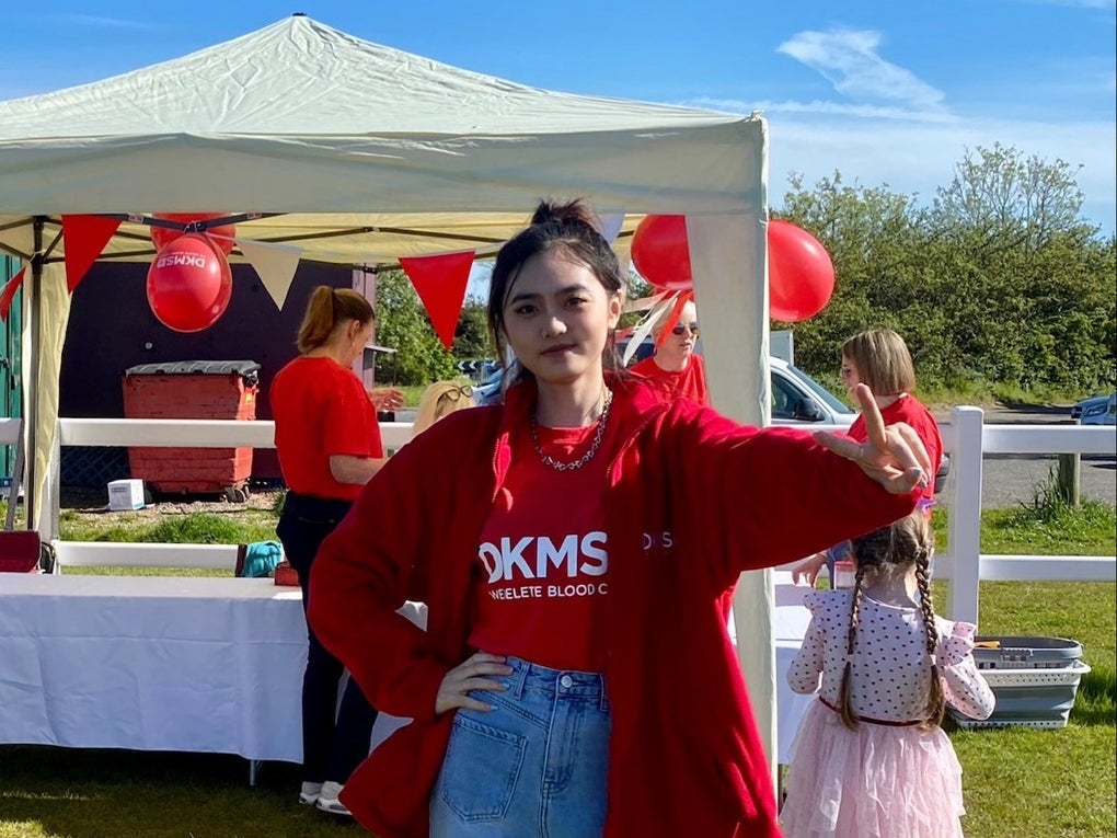 DKMS volunteer at an event DKMS volunteer at an event