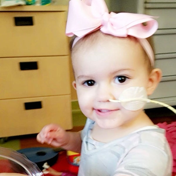 Little girl with a nose tube Little girl with a nose tube