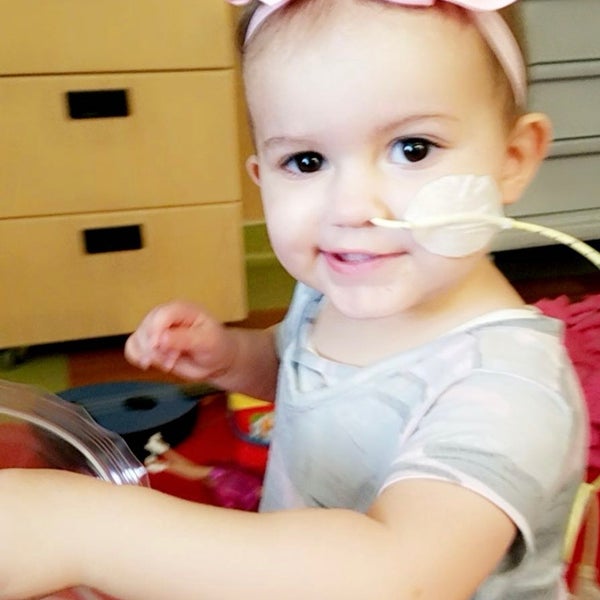 Little girl with a nose tube Little girl with a nose tube