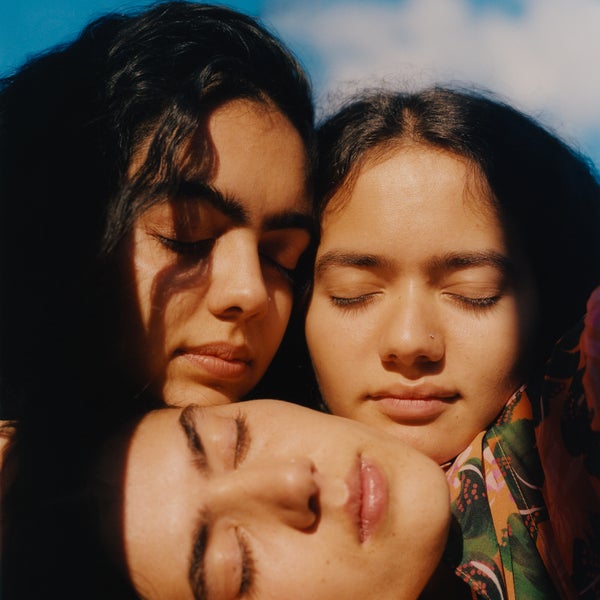 Image of three Asian female faces with their eyees closed Image of three Asian female faces with their eyees closed
