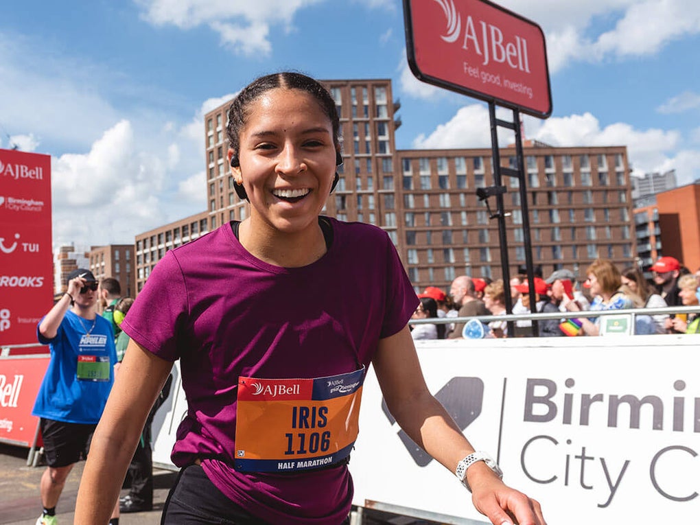 Smiling runner just crossed the finish line at the Great Birmingham Run Smiling runner just crossed the finish line at the Great Birmingham Run