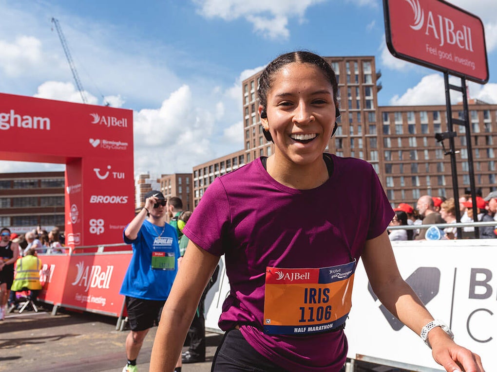 Smiling runner just crossed the finish line at the Great Birmingham Run Smiling runner just crossed the finish line at the Great Birmingham Run