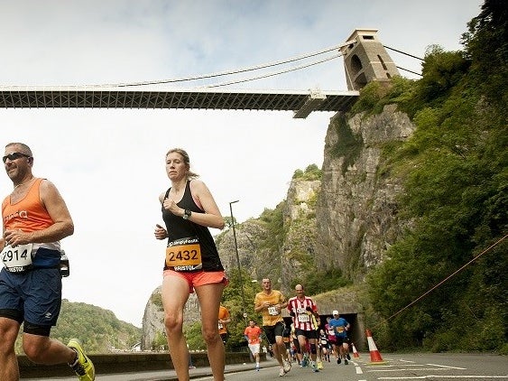 Runners with Clifton Suspension Bridge in the background Runners with Clifton Suspension Bridge in the background