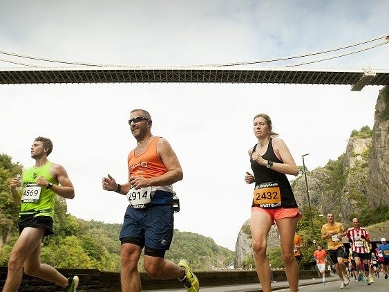 Runners with Clifton Suspension Bridge in the background Runners with Clifton Suspension Bridge in the background