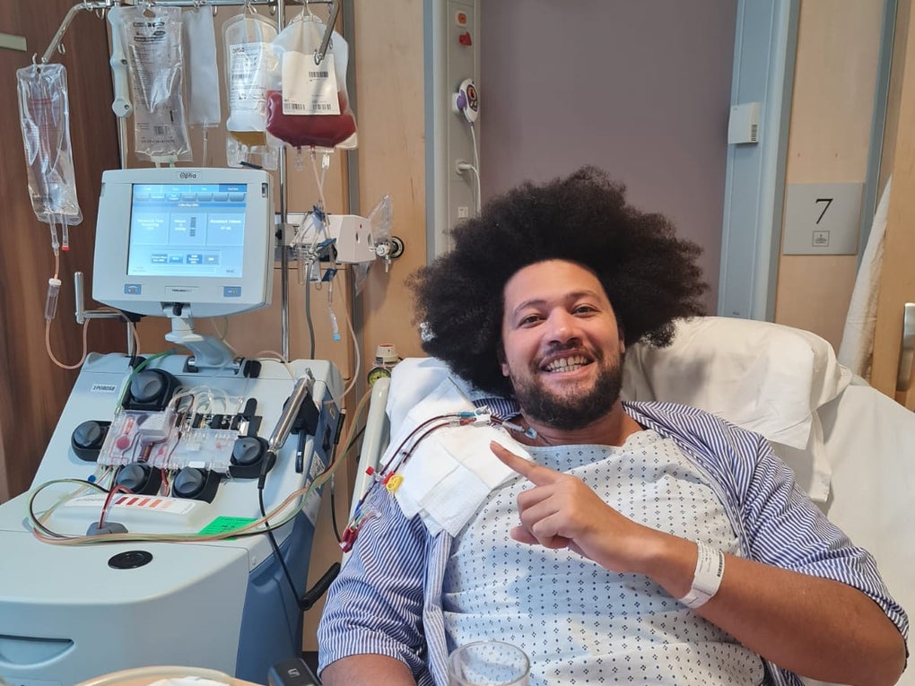 Fraser lying on hospital bed giving hs donation Fraser lying on hospital bed giving hs donation