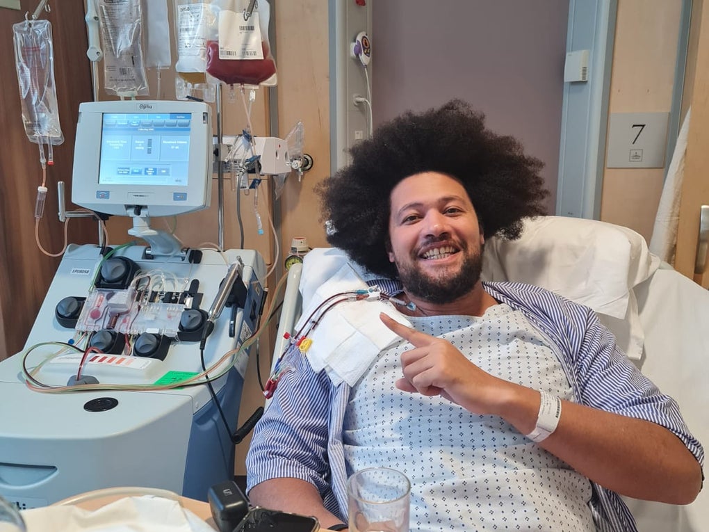 Fraser lying on hospital bed giving hs donation Fraser lying on hospital bed giving hs donation