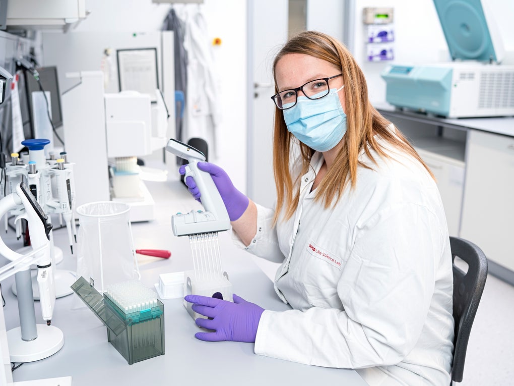 Female research scientist in laboratory Female research scientist in laboratory