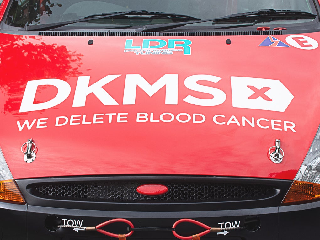Bonnet of the DKMS car showing the DKMS 'We delete blood cancer' logo Bonnet of the DKMS car showing the DKMS 'We delete blood cancer' logo