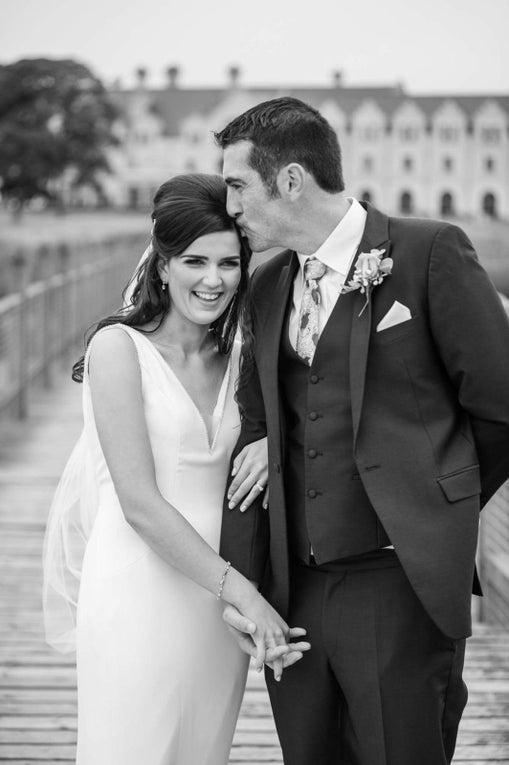 Tracy and her husband on her wedding day Tracy and her husband on her wedding day