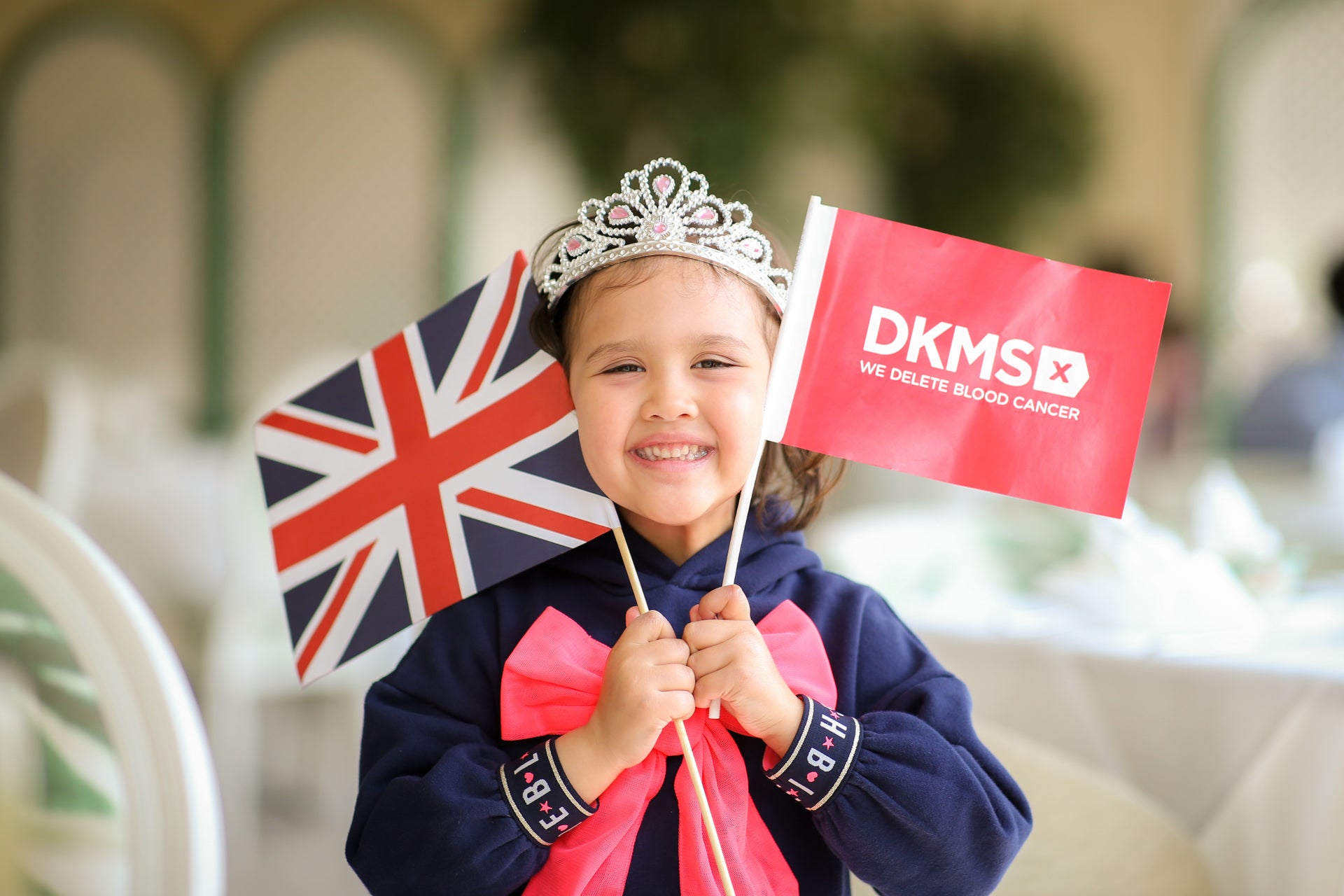 Livia with a Union Jack and DKMS flag