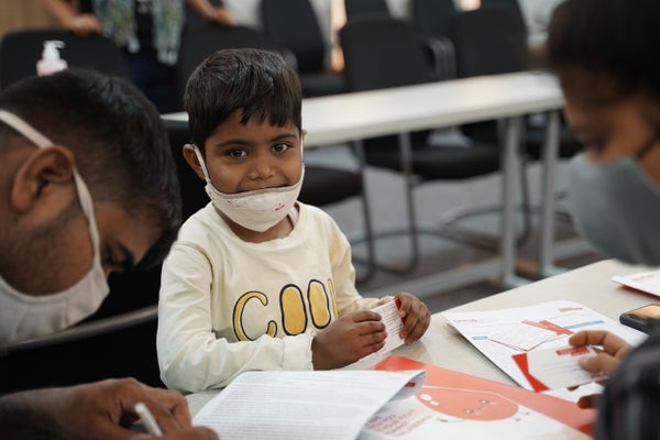 Young Indian boy waiting for treatment at a thassalemia camp