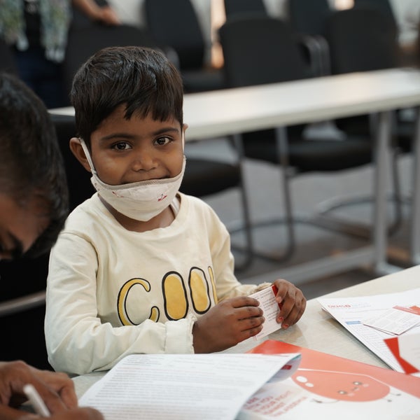 Young Indian boy waiting for treatment at a thassalemia camp