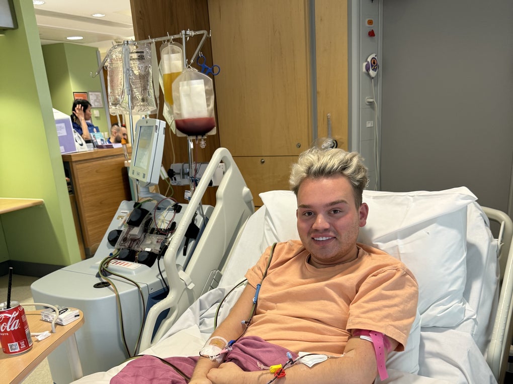 Young white man with blond hair smiling on the hospital bed Young white man with blond hair smiling on the hospital bed