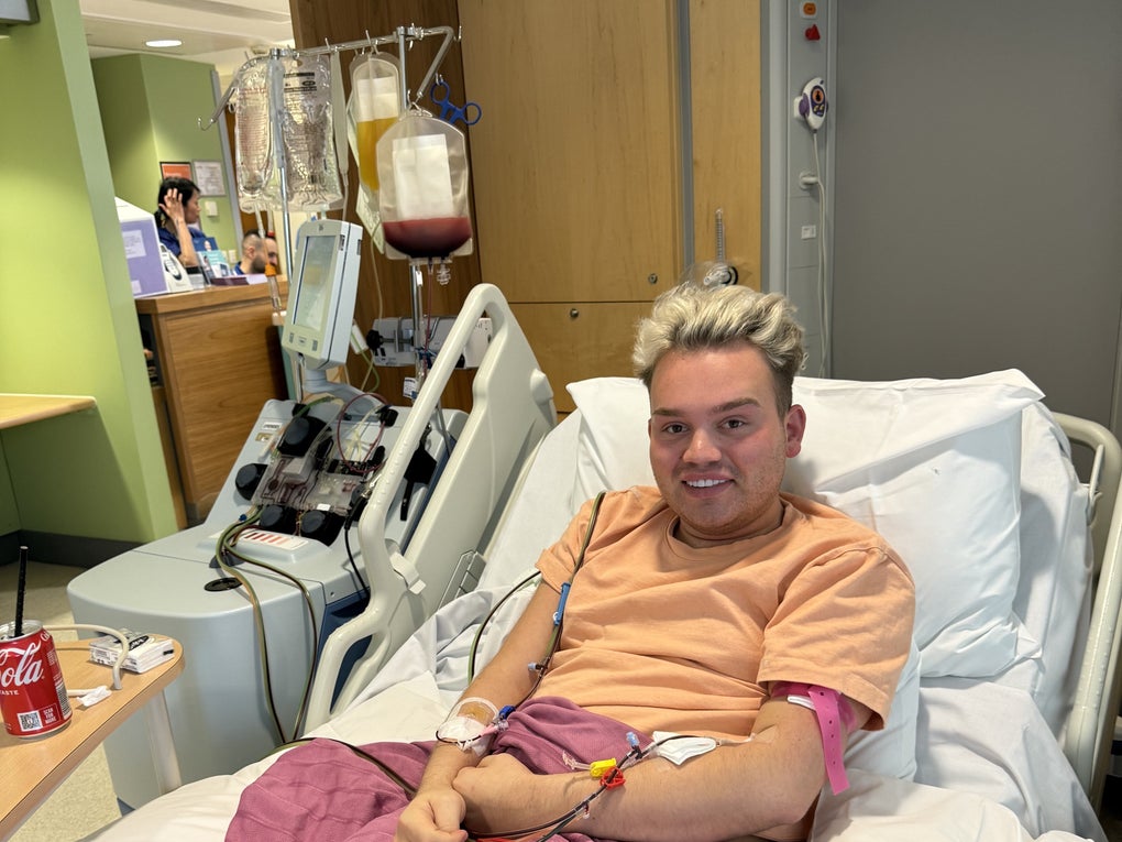 Young white man with blond hair smiling on the hospital bed Young white man with blond hair smiling on the hospital bed
