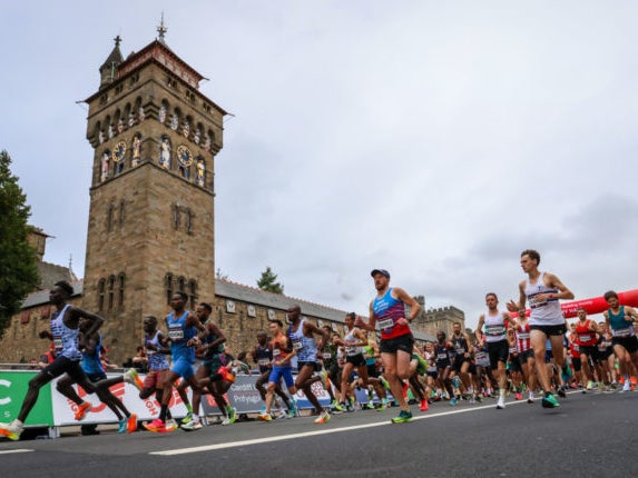 Runners going past Cardiff Castle Runners going past Cardiff Castle