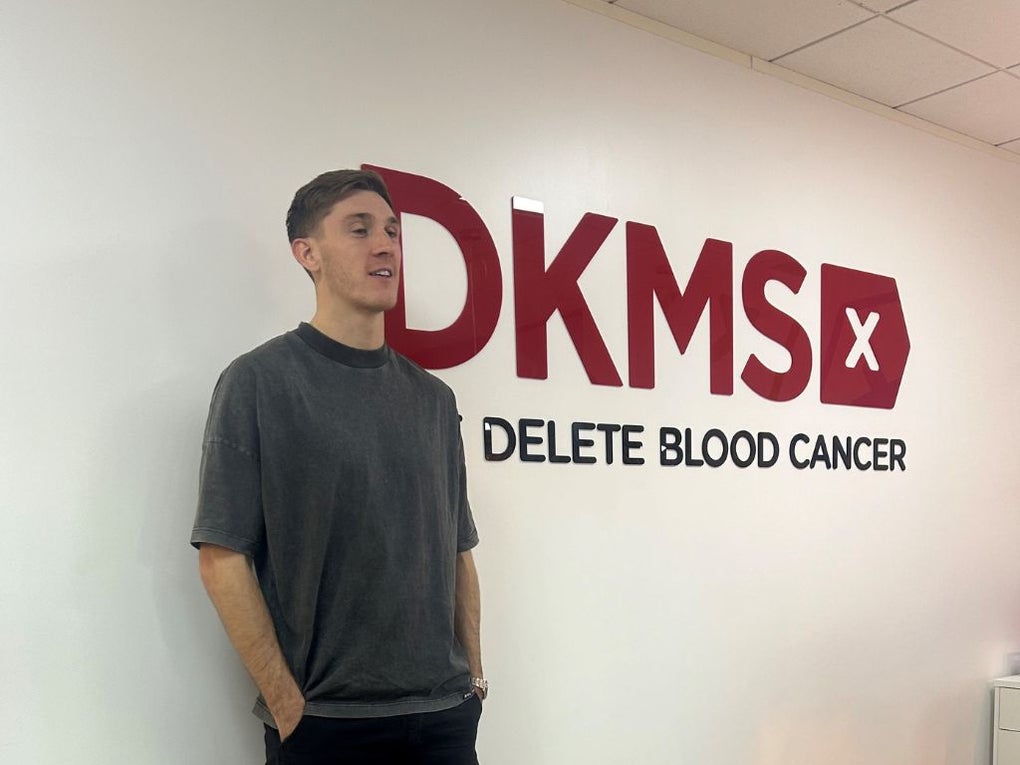 Jimmy Dunne at the DKMS UK office standing by the Corporate signage Jimmy Dunne at the DKMS UK office standing by the Corporate signage