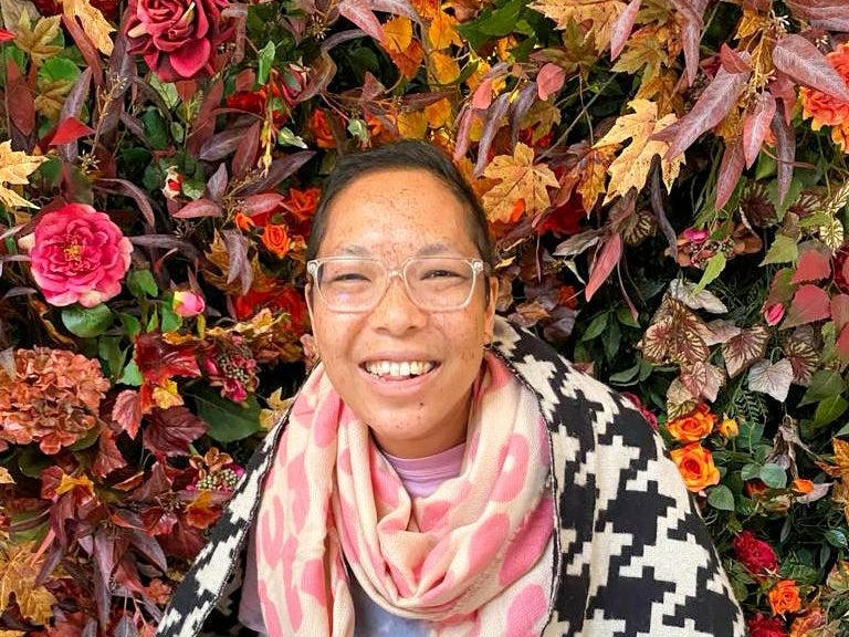 Yvette in a garden, smiling Yvette in a garden, smiling