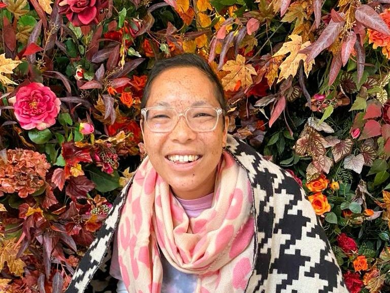 Yvette in a garden, smiling Yvette in a garden, smiling