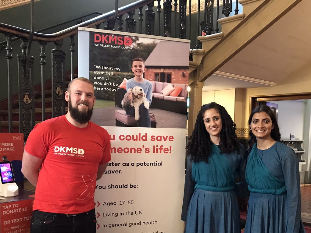Liam next to DKMS Volunteers at an event Liam next to DKMS Volunteers at an event