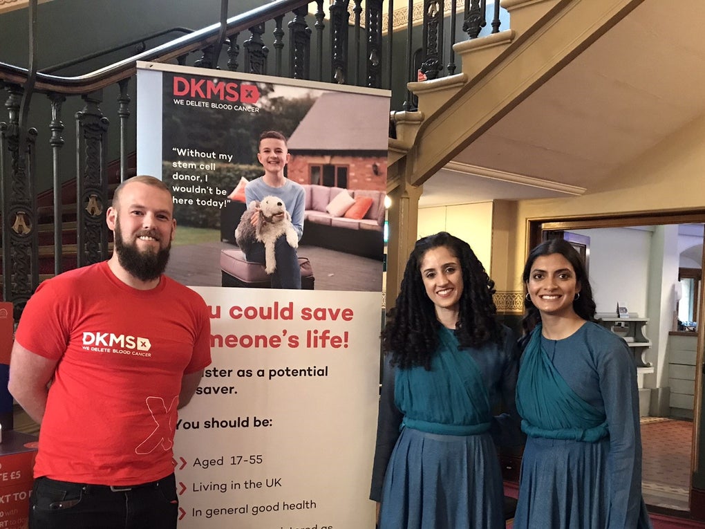 Liam next to DKMS Volunteers at an event Liam next to DKMS Volunteers at an event