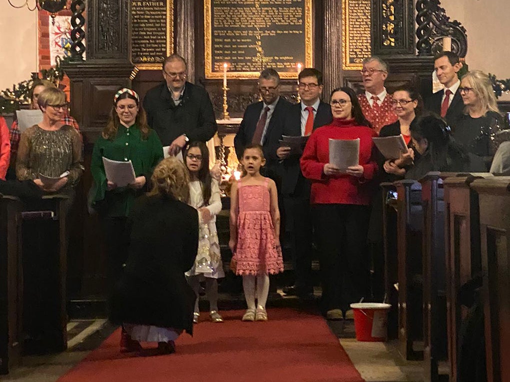 Elsie (left) and Livia singing with the ING choir Elsie (left) and Livia singing with the ING choir