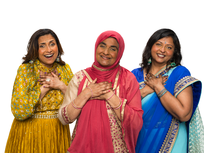 Three middled aged Asian women in sarees smiling Three middled aged Asian women in sarees smiling