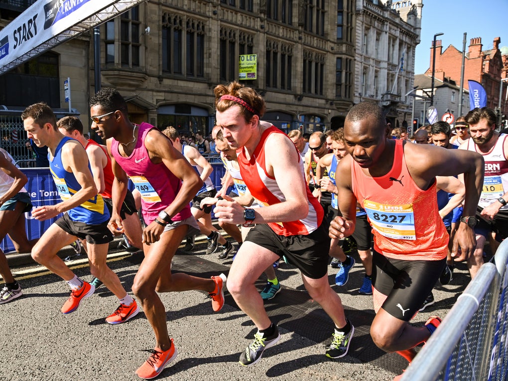 Runners moving from the start line at the Leeds Marathon Runners moving from the start line at the Leeds Marathon