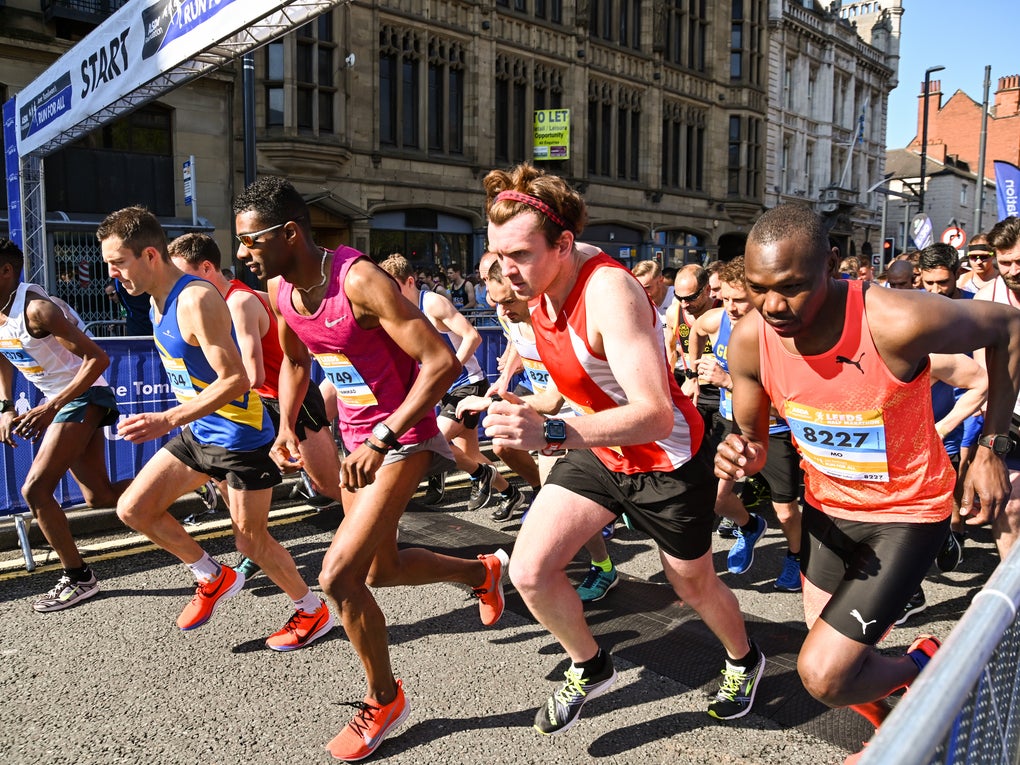 Runners moving from the start line at the Leeds Marathon Runners moving from the start line at the Leeds Marathon