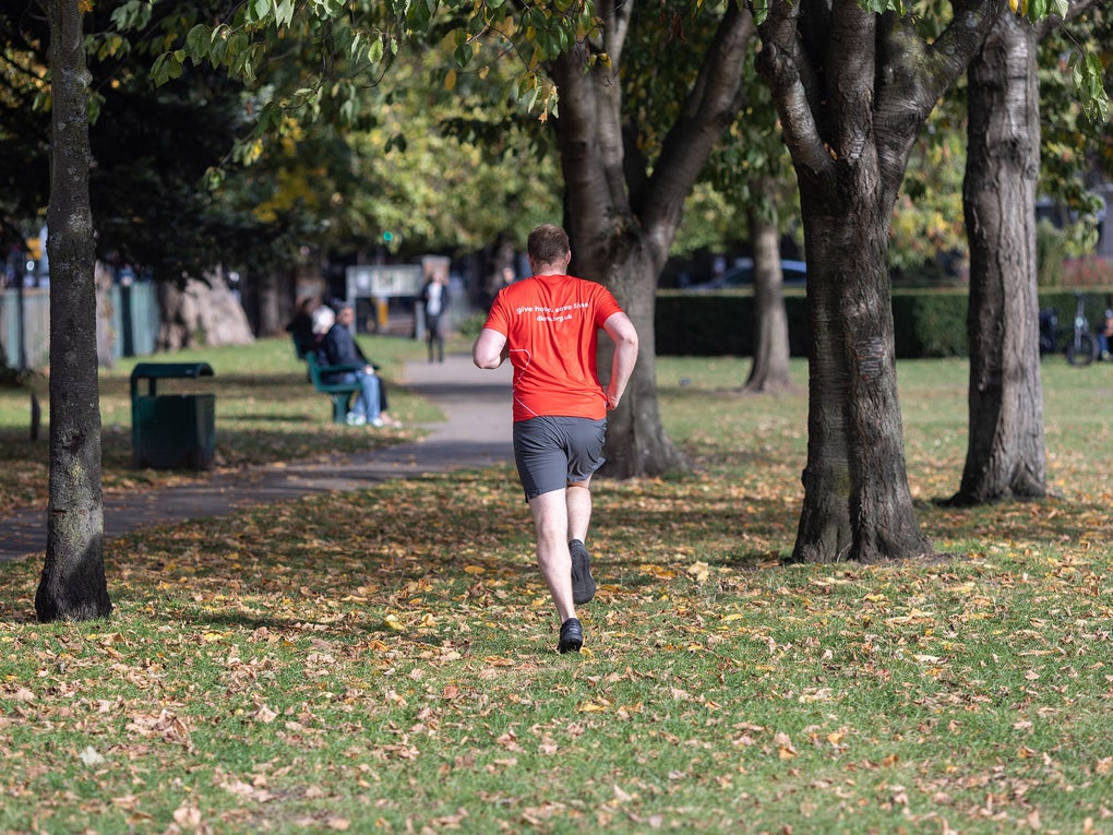 Man in red t-shirt running Man in red t-shirt running